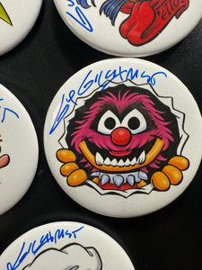 Select a 2.5” Button, art by Guy Gilchrist