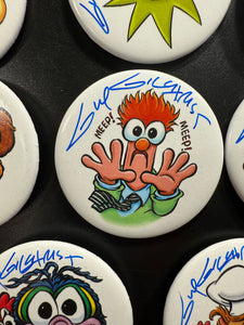 Select a 2.5” Button, art by Guy Gilchrist