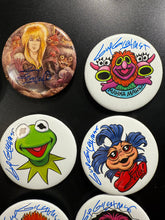 Load image into Gallery viewer, Select a 2.5” Button, art by Guy Gilchrist
