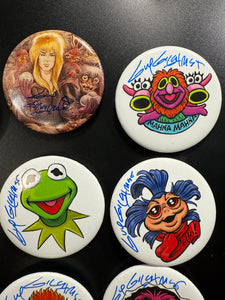 Select a 2.5” Button, art by Guy Gilchrist