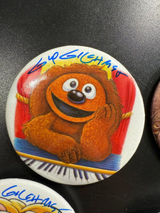 Select a 2.5” Button, art by Guy Gilchrist