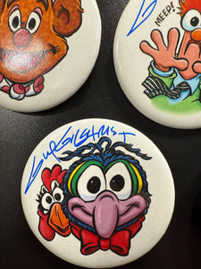 Select a 2.5” Button, art by Guy Gilchrist