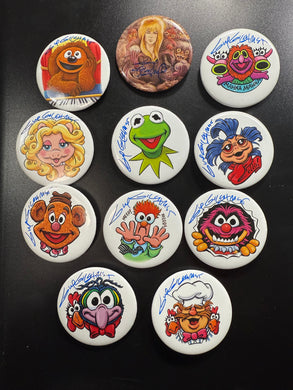 Select a 2.5” Button, art by Guy Gilchrist